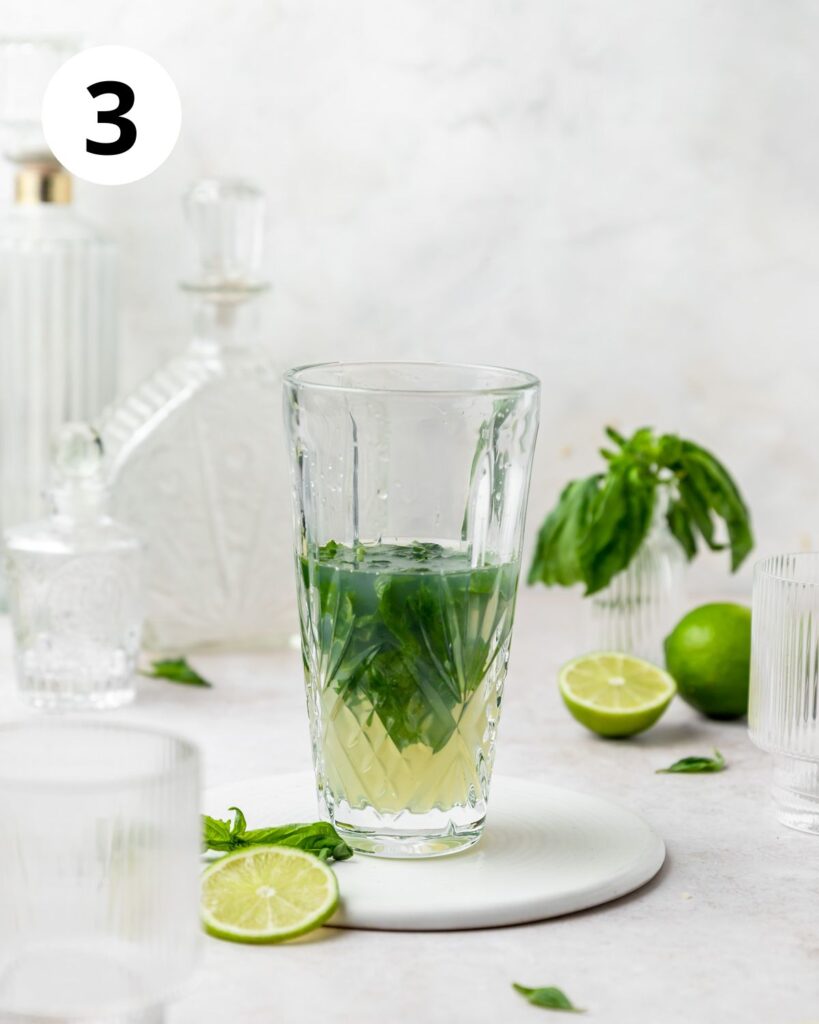 gin basil gimlet in cocktail shaker.