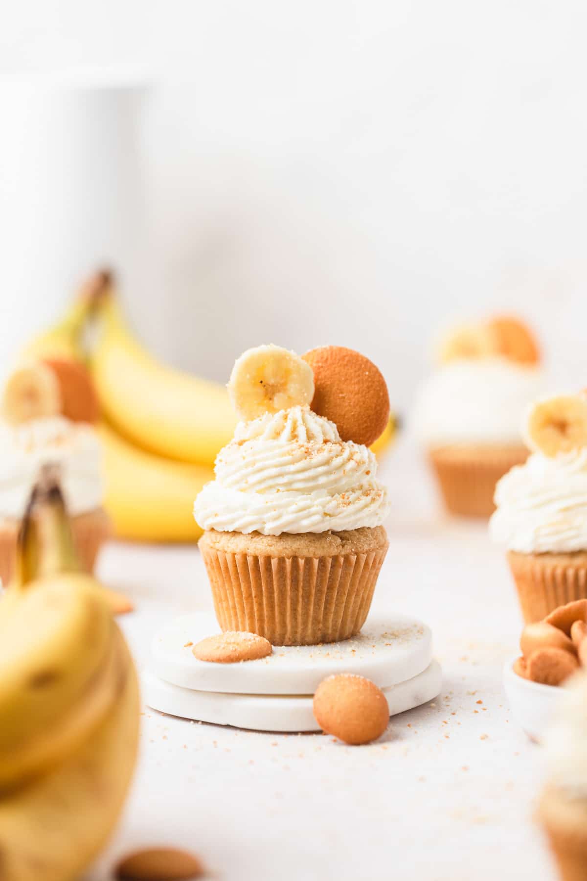 banana pudding cupcakes topped with nilla wafers.