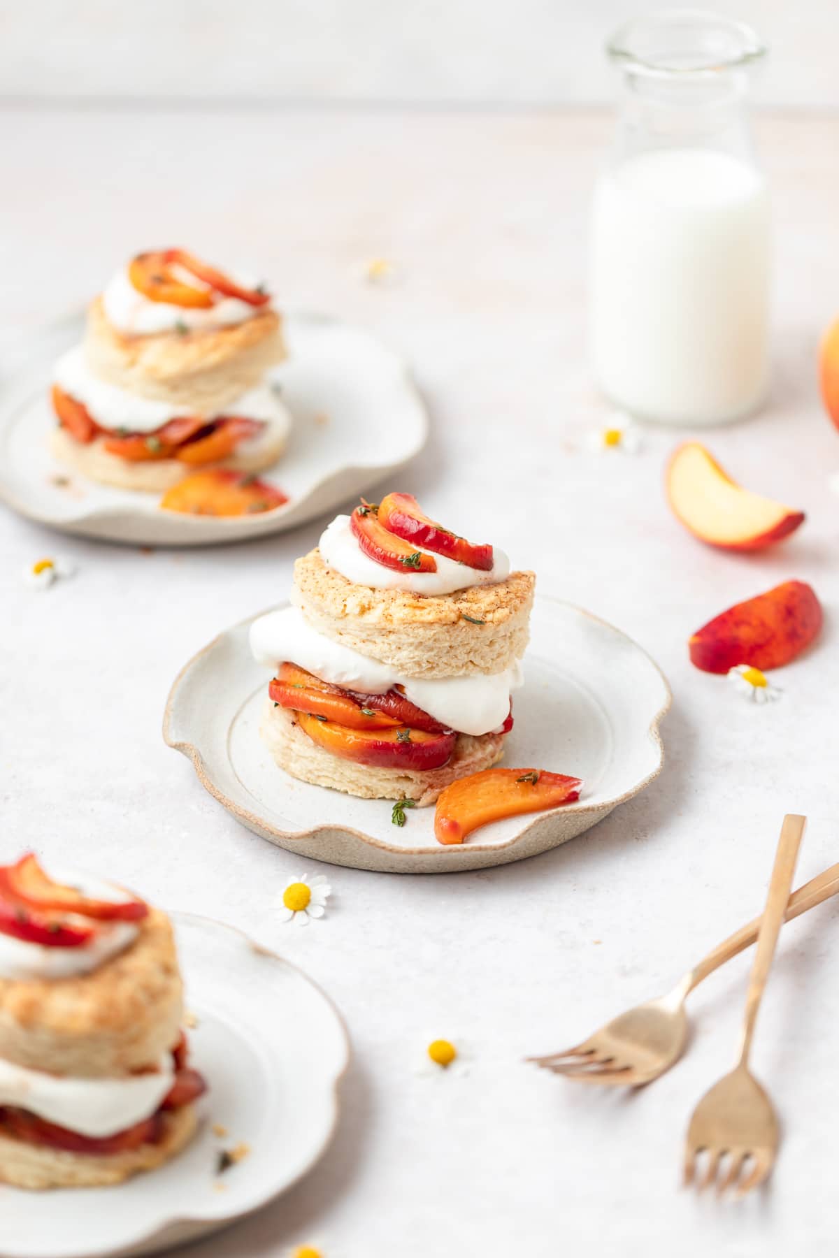 roasted peach shortcake biscuits with whipped cream.