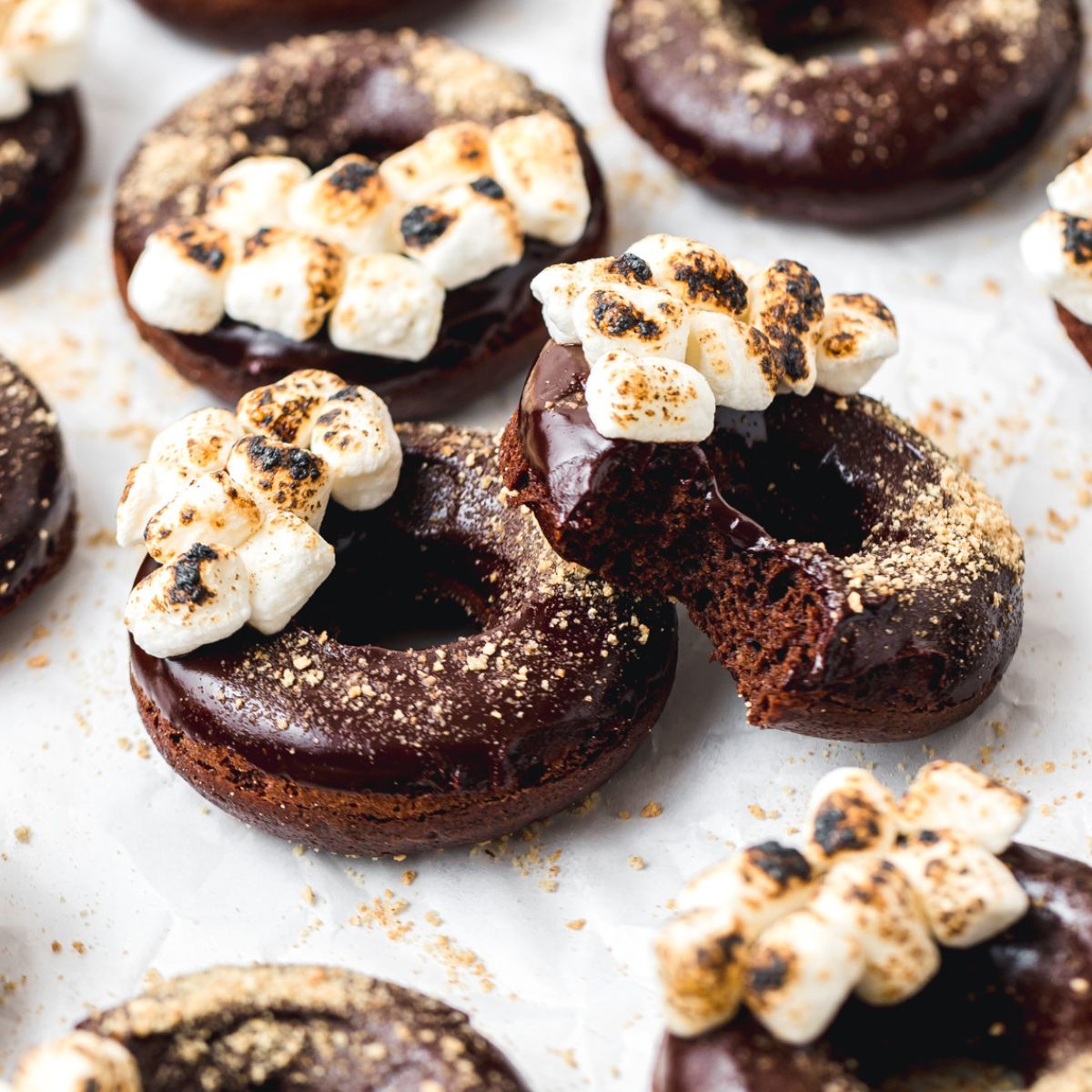 close up shot of baked s'mores donuts.