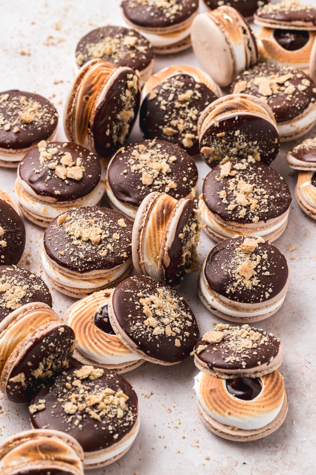 s'mores macarons with chocolate shells and toasted meringue. 