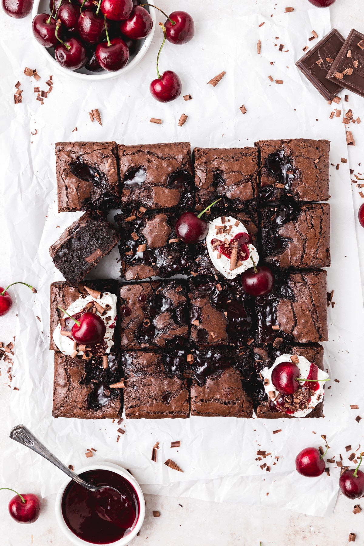 fudgy black forest cherry brownies with whipped cream.