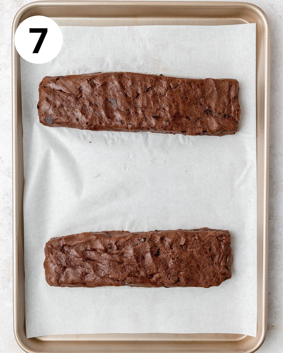 dark chocolate biscotti logs before baking.