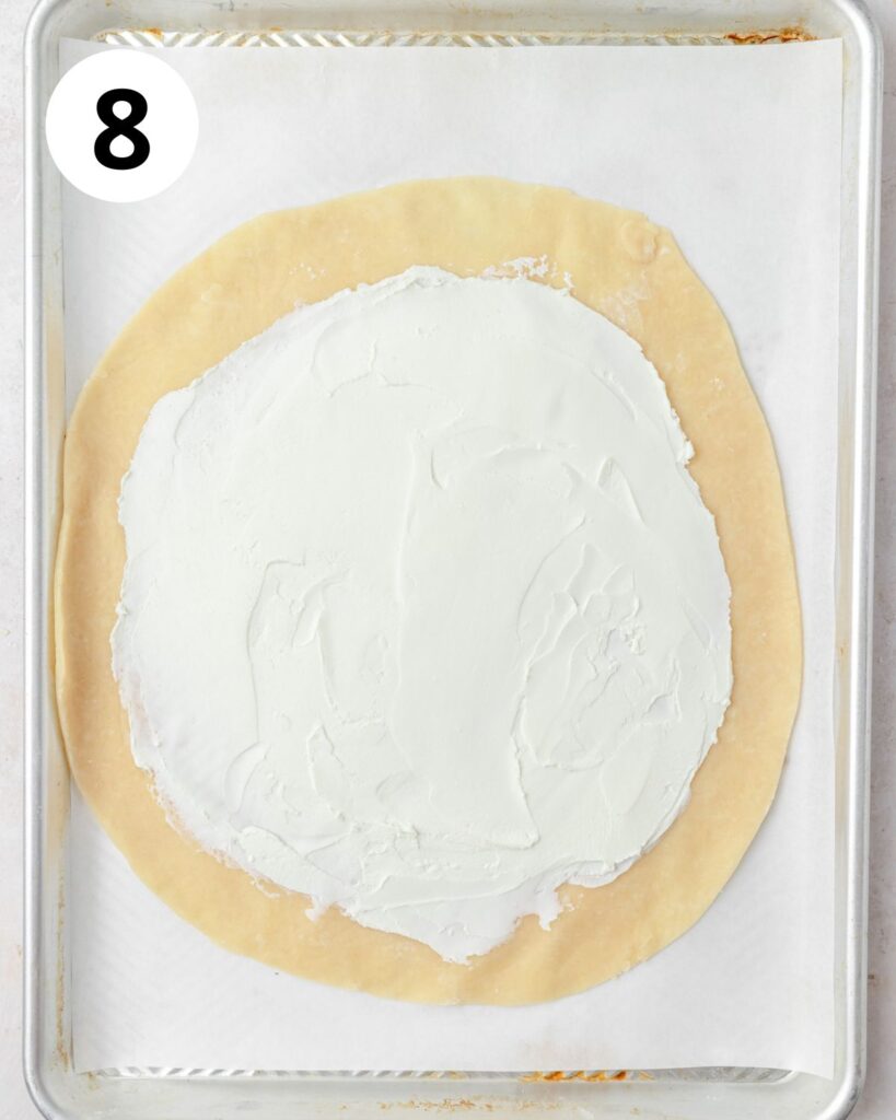 parmesan pie crust spread with goat cheese.