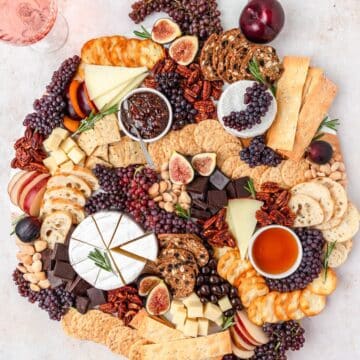 close up shot of fall dessert fruit and cheese board.