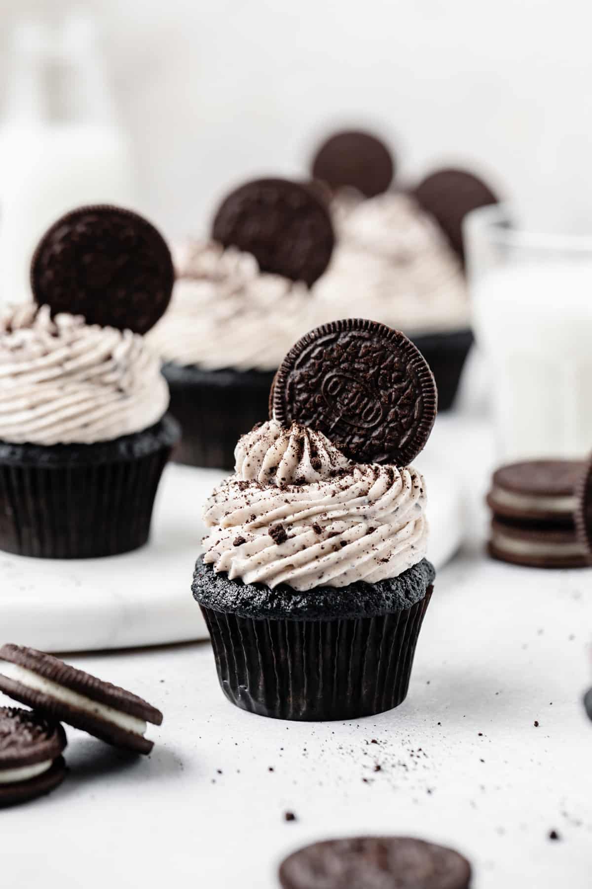 cookies and cream cupcakes with oreo cookies on top!