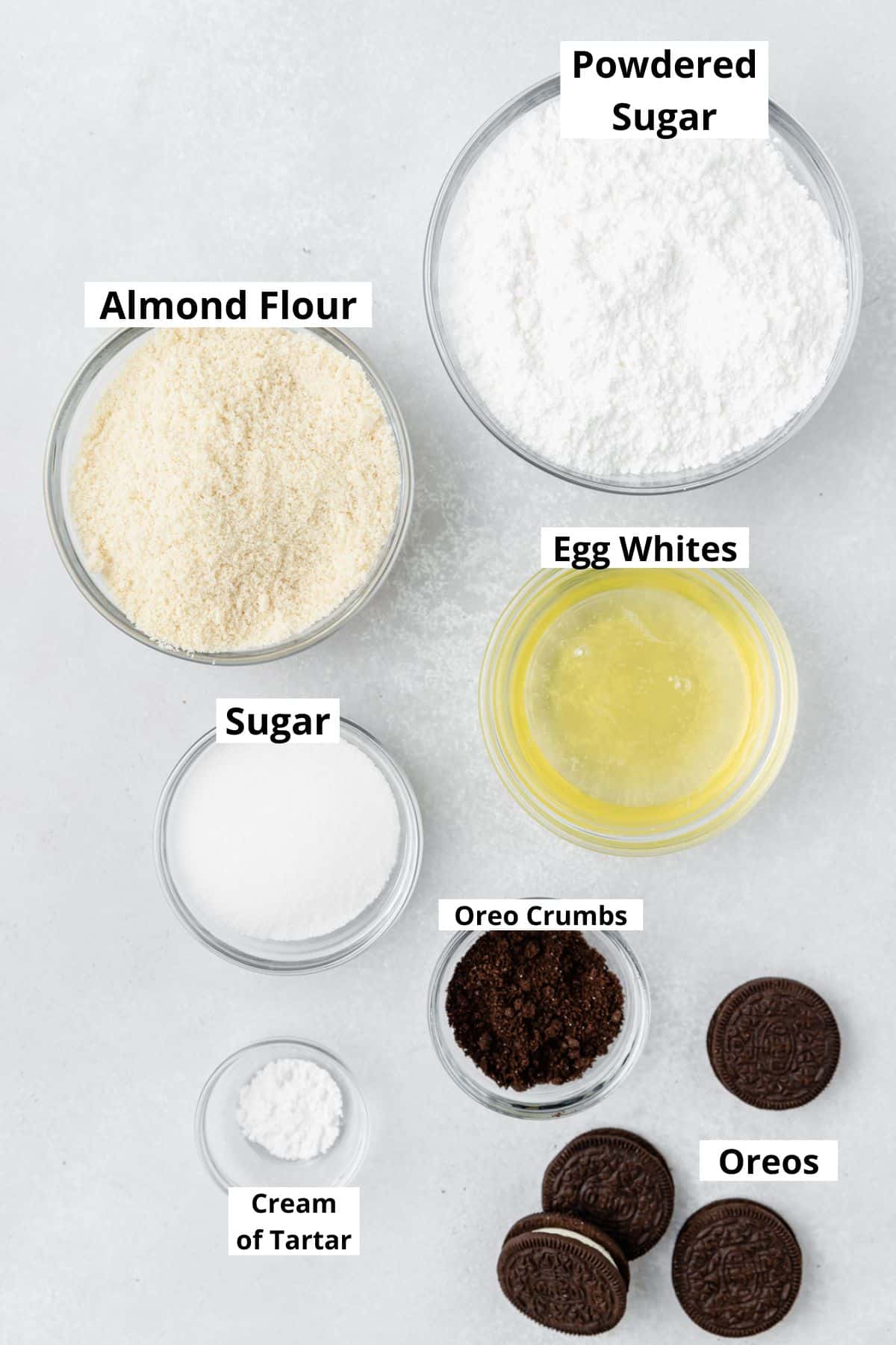 labeled shot of ingredients for cookies and cream macarons.