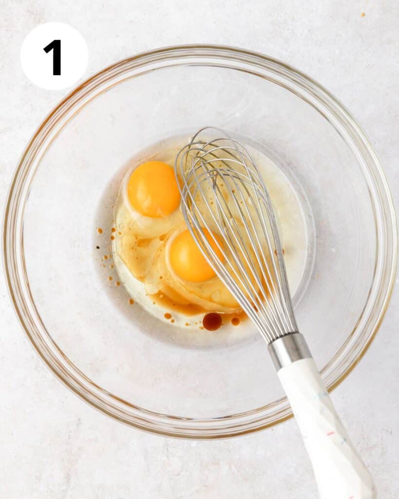 whisking vegetable oil and eggs in bowl.