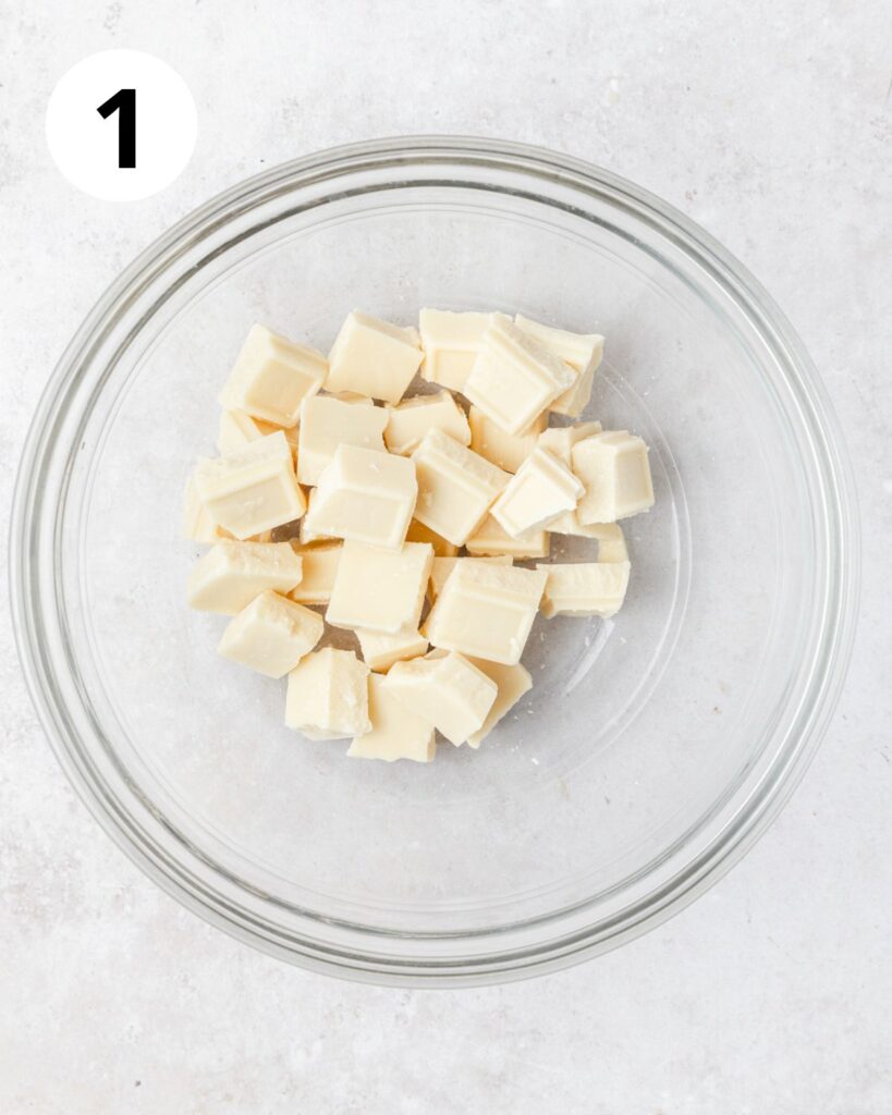 chopped white chocolate in bowl.