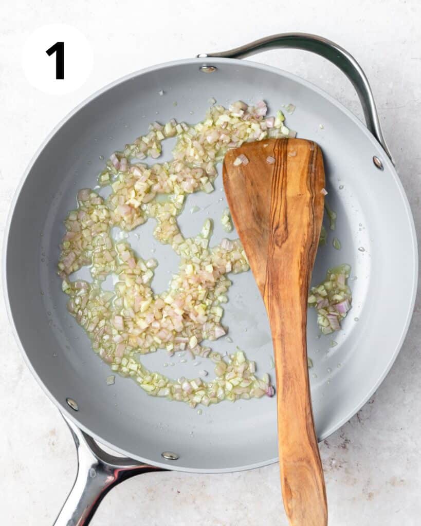 sautéing shallots and garlic in pan.