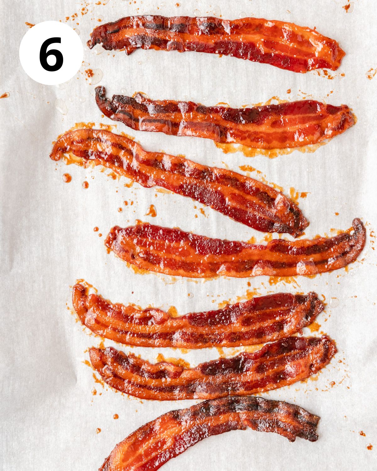 candied bacon on baking sheet.