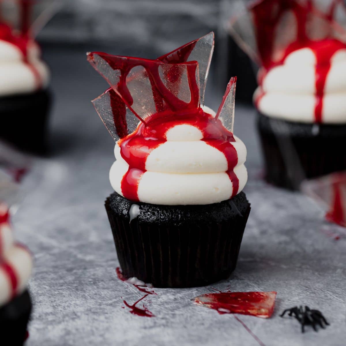 close up shot of bloody broken glass cupcakes for halloween.