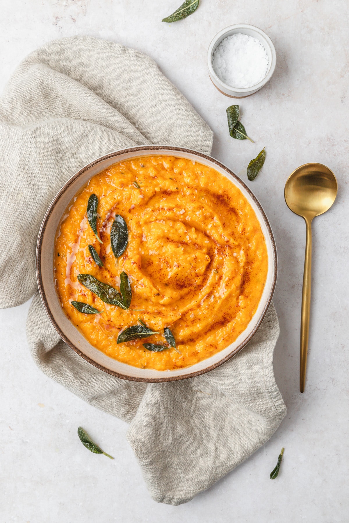 bowl of creamy butternut squash with brown butter.