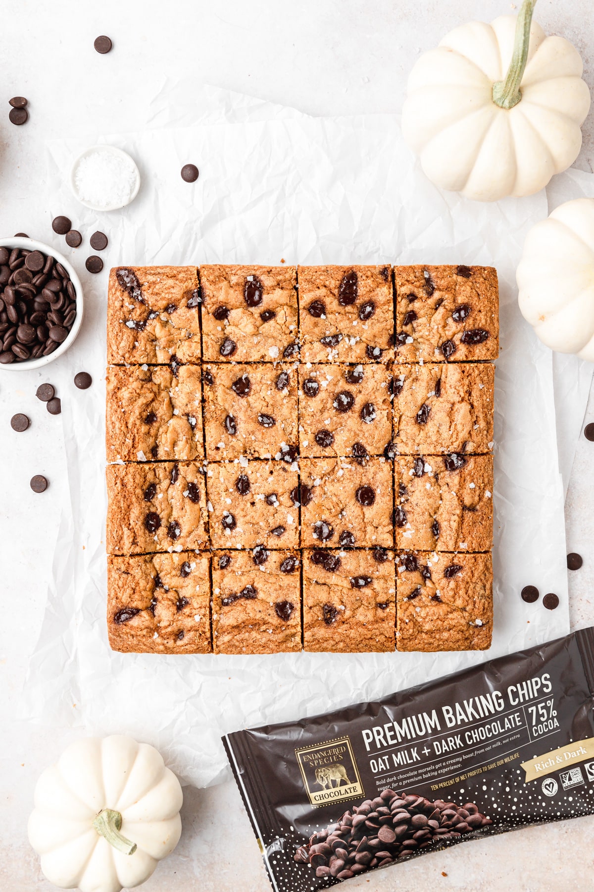 pumpkin chocolate chip blondies with bag of chocolate chips.