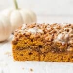 close up shot of pumpkin coffee cake with pecan streusel.