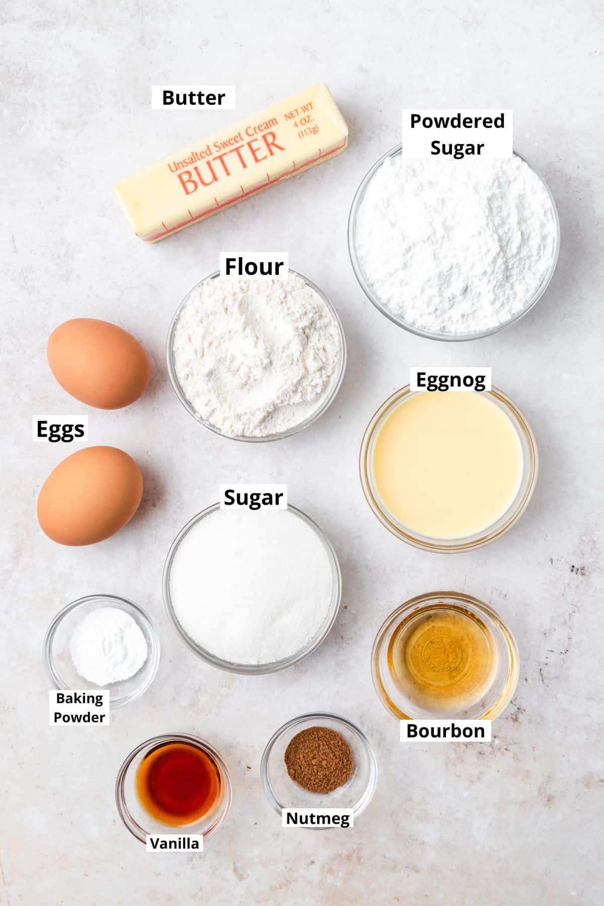 labeled ingredients for eggnog cupcakes.