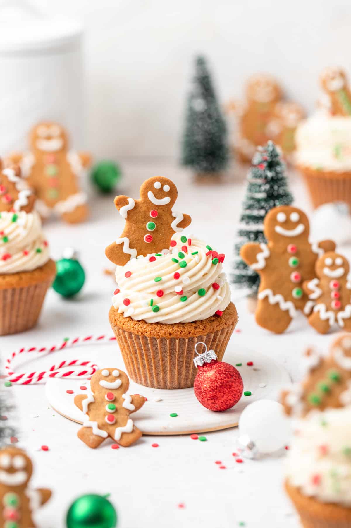 gingerbread cupcakes topped with mini gingerbread men.