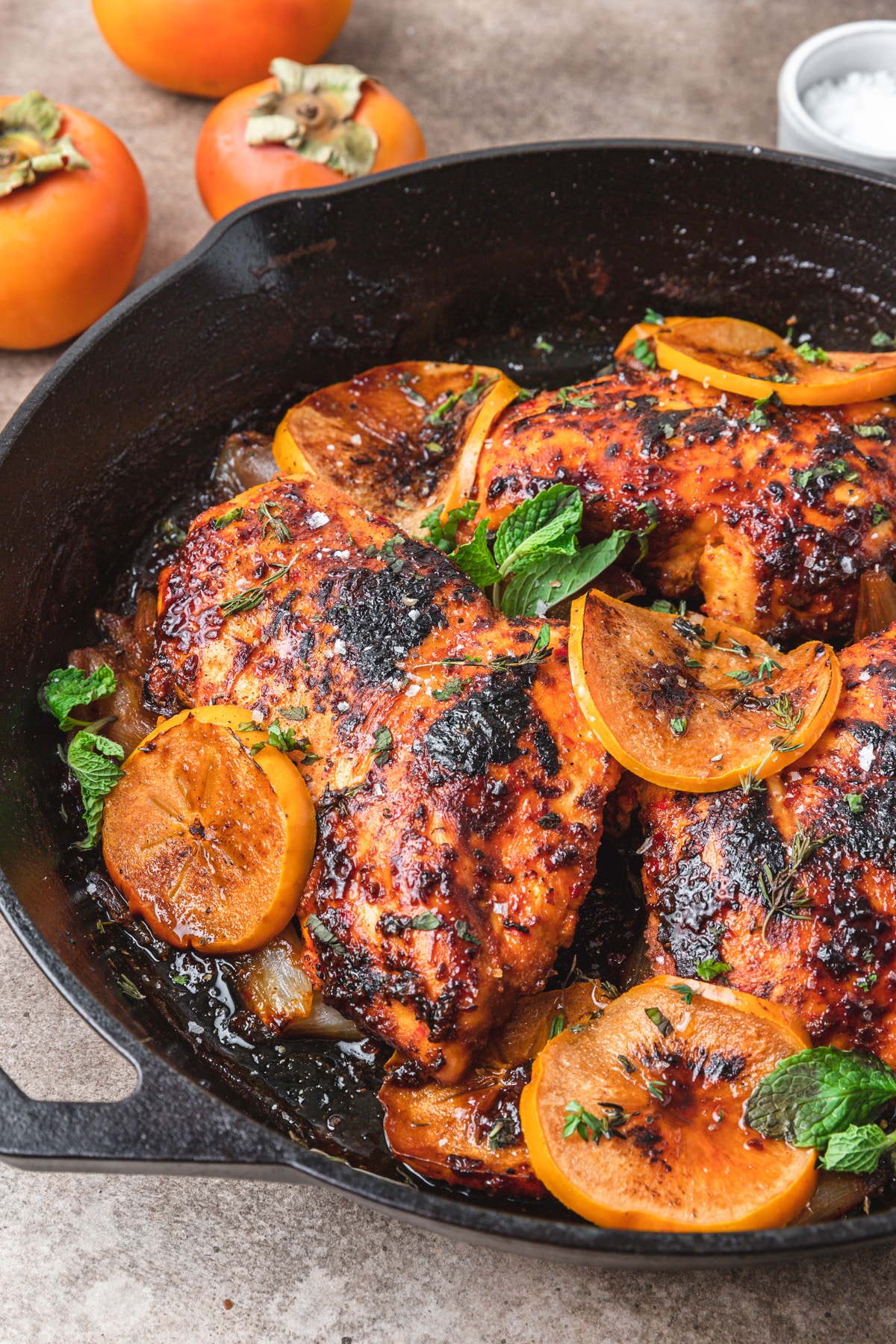 harissa roasted chicken with fuyu persimmons.