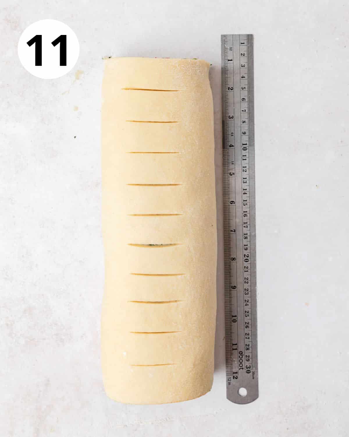 measuring rolls before cutting into even slices.