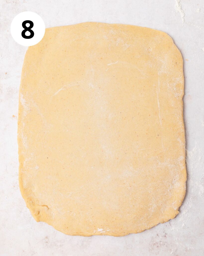 eggnog dough rolled out into large rectangle. 