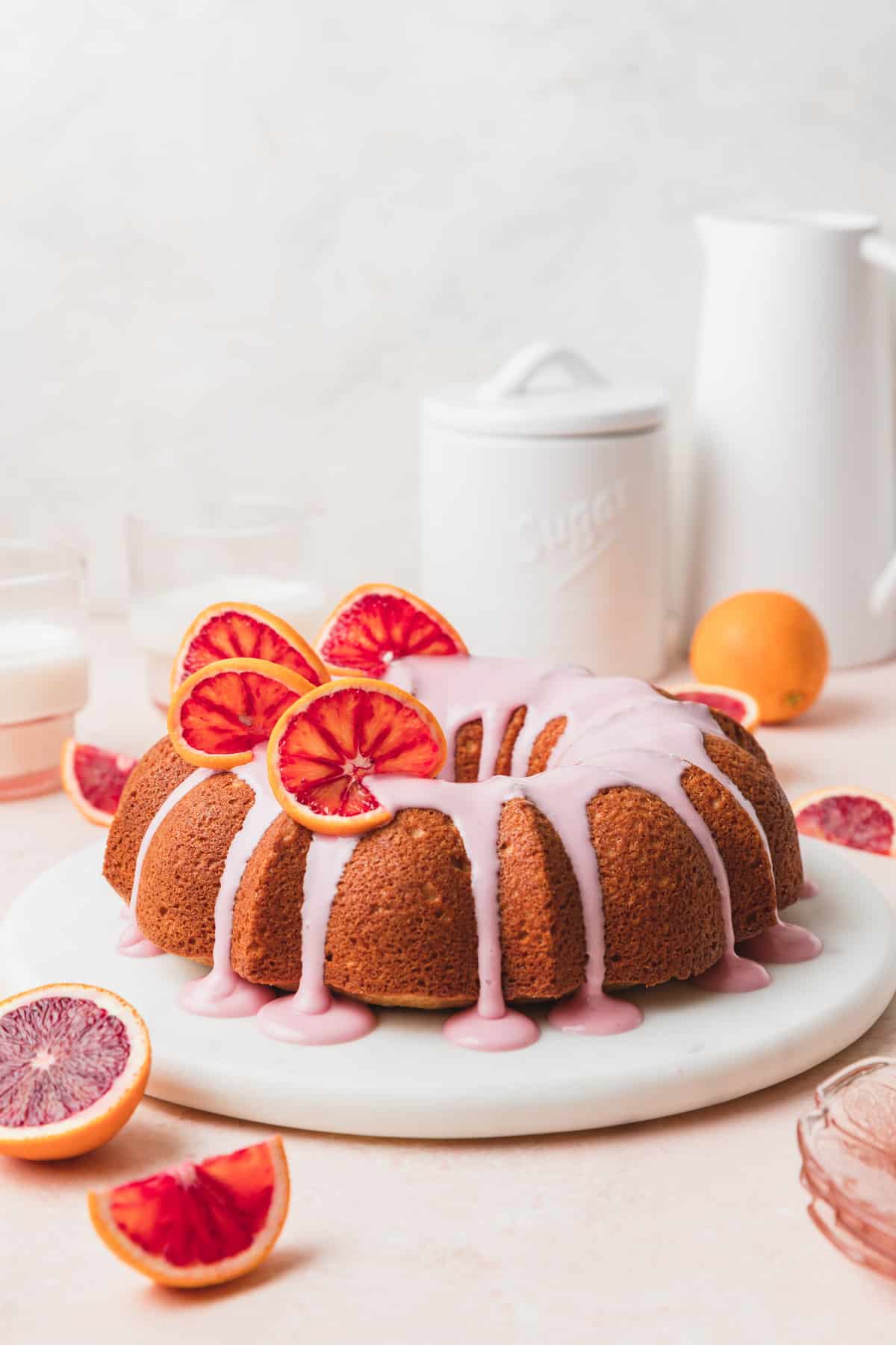 blood orange bundt cake with pink orange glaze.