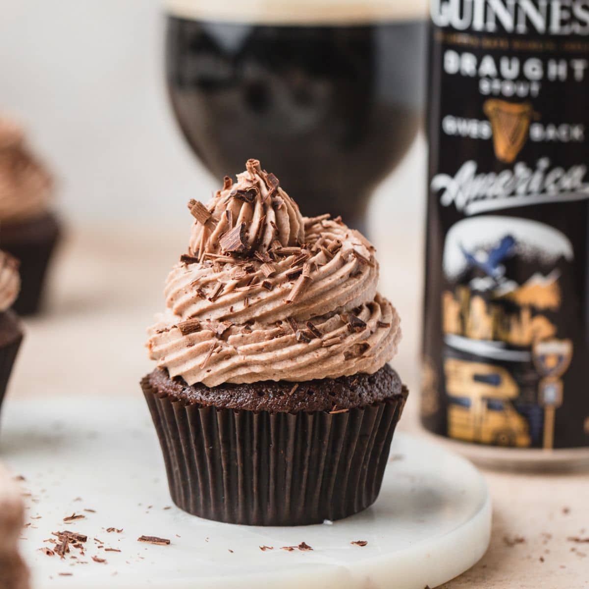close up shot of guinness chocolate cupcakes with stout buttercream.