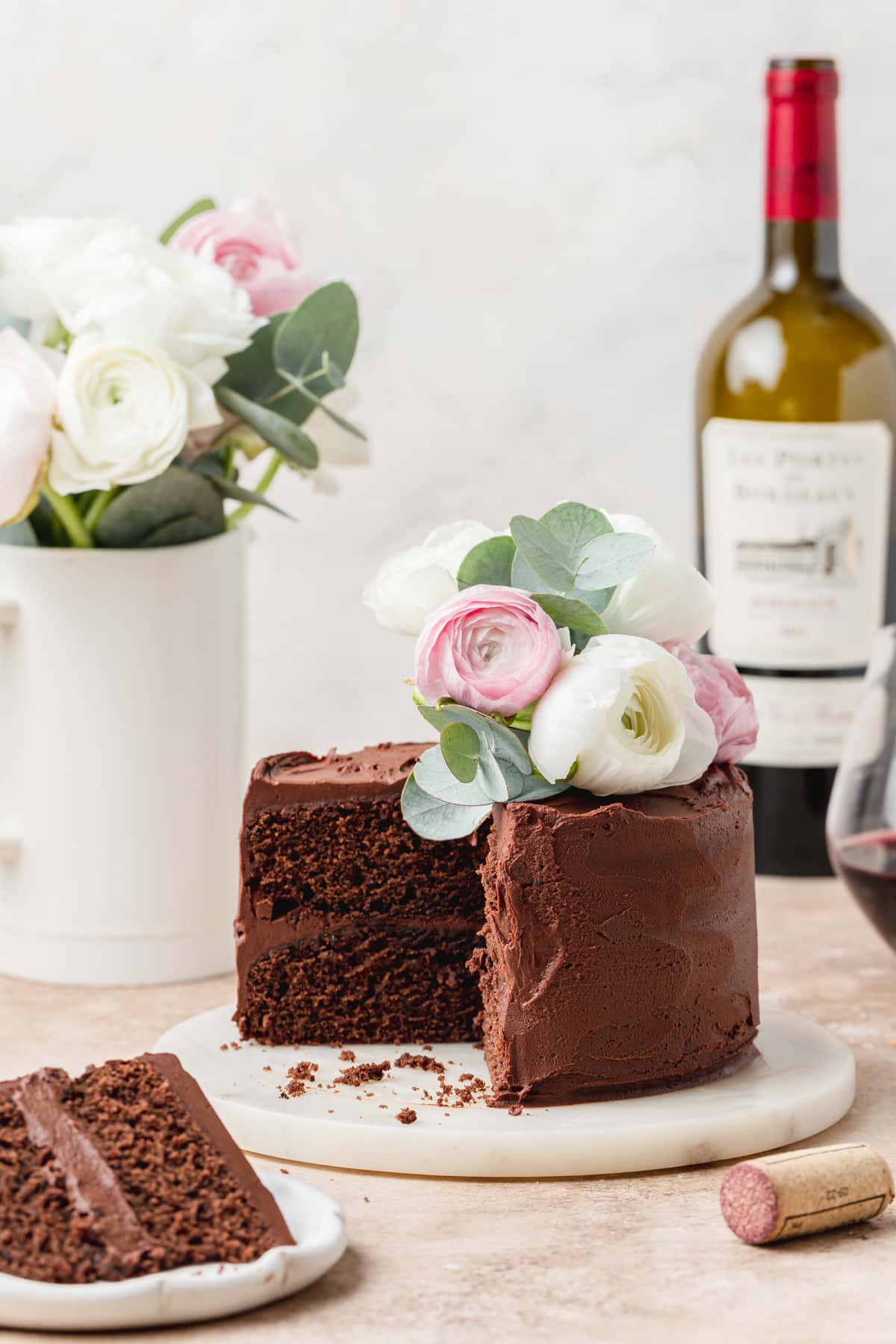 red wine chocolate cake with slices cut out.