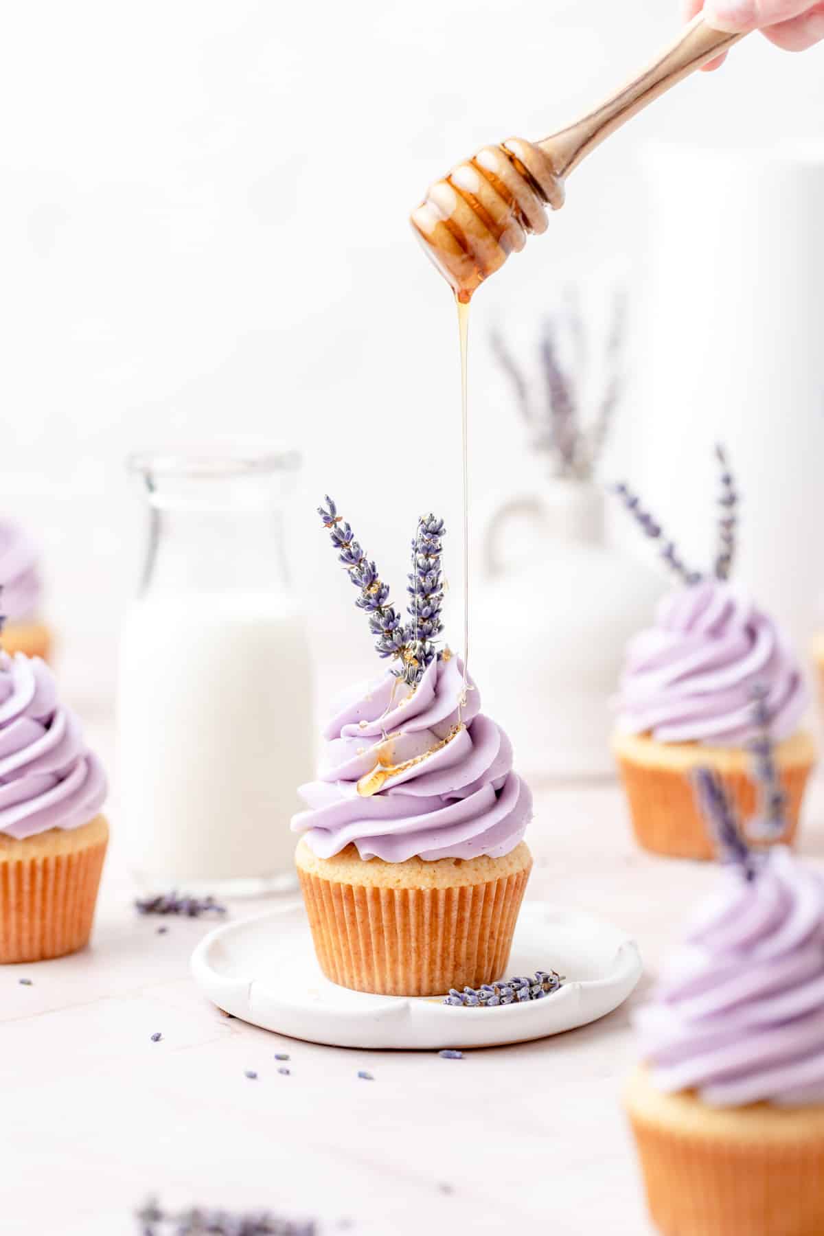 drizzling honey on lavender cupcakes.