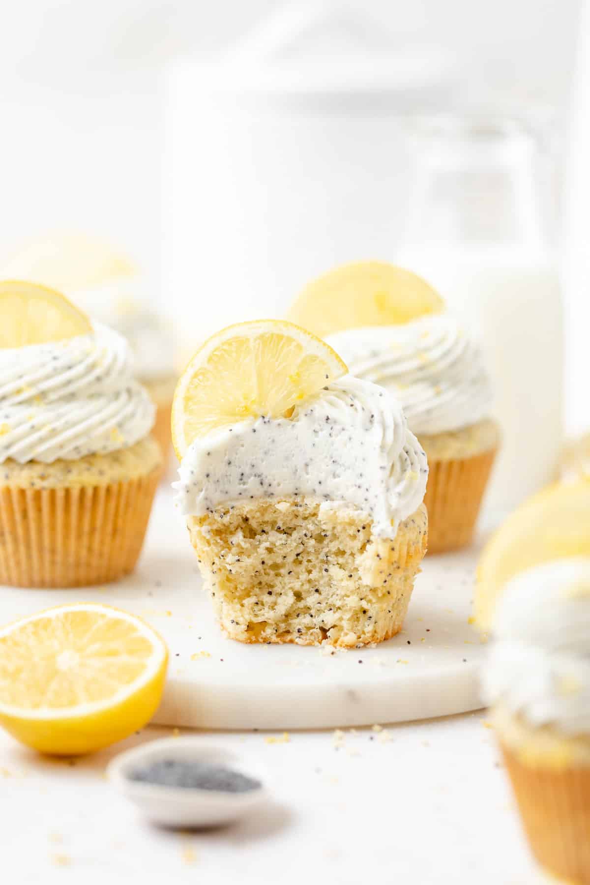 lemon poppy seed cupcakes with tangy cream cheese frosting.