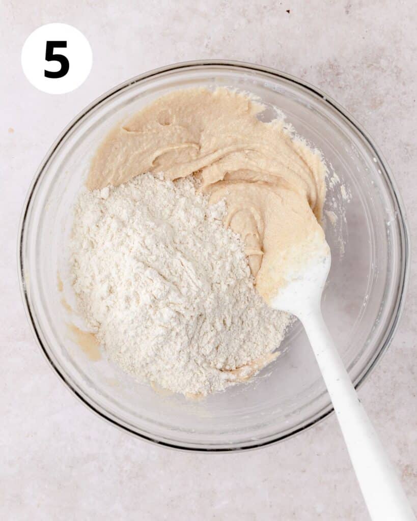 adding heat treated flour to cookie dough.