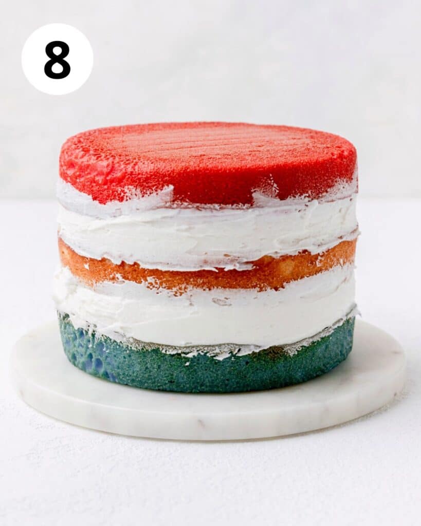 stacking red white and blue cake layers.