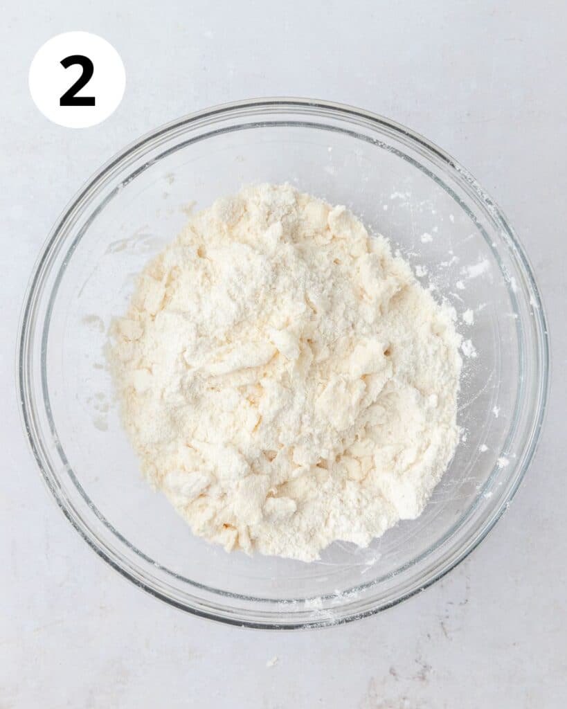butter crumbled into flour.