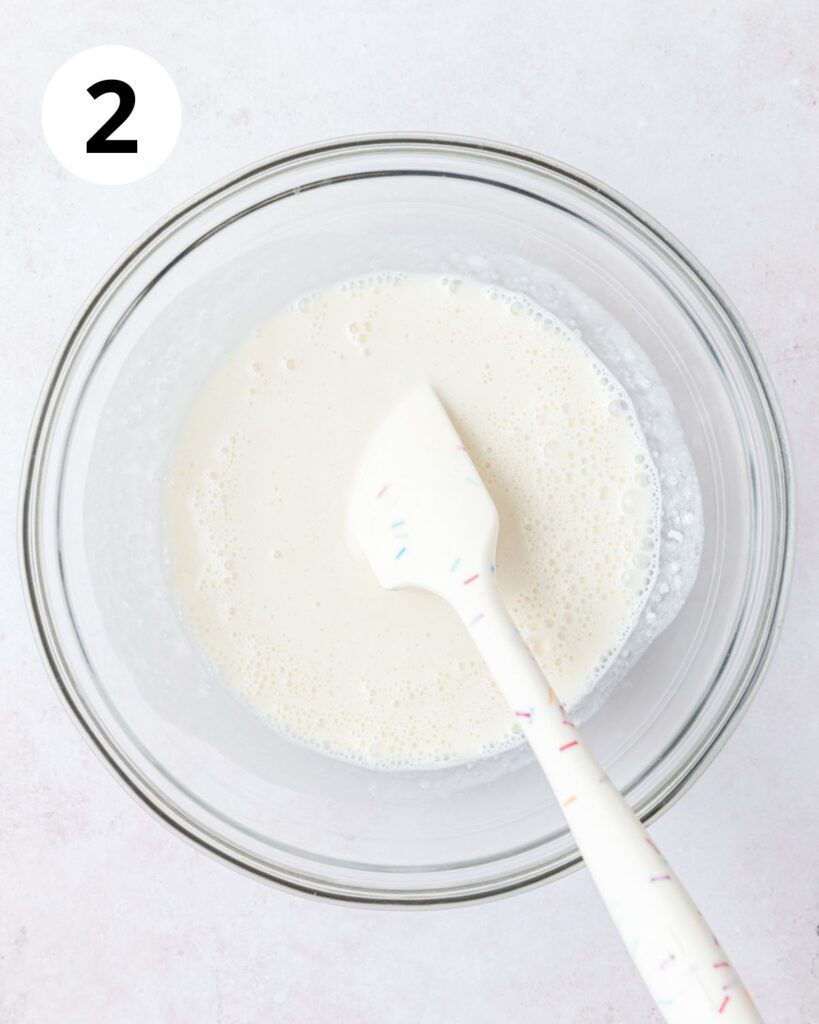 adding buttermilk to sourdough starter.