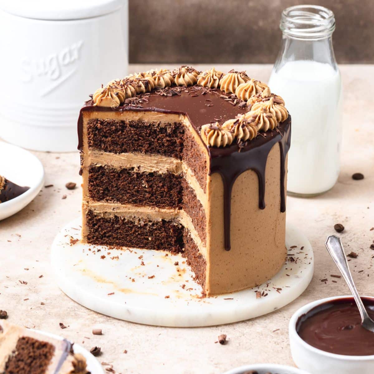 close up shot of chocolate espresso cake with chocolate cake layers and chocolate ganache.