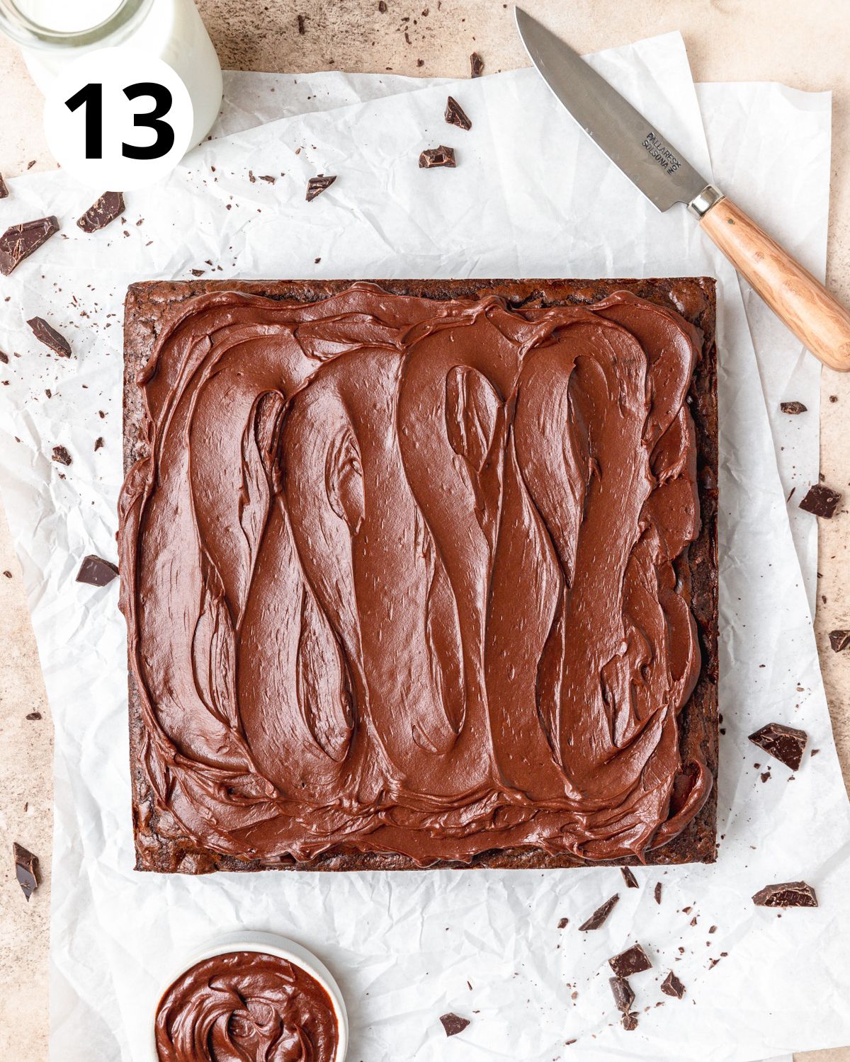 frosting brownies with chocolate ganache.