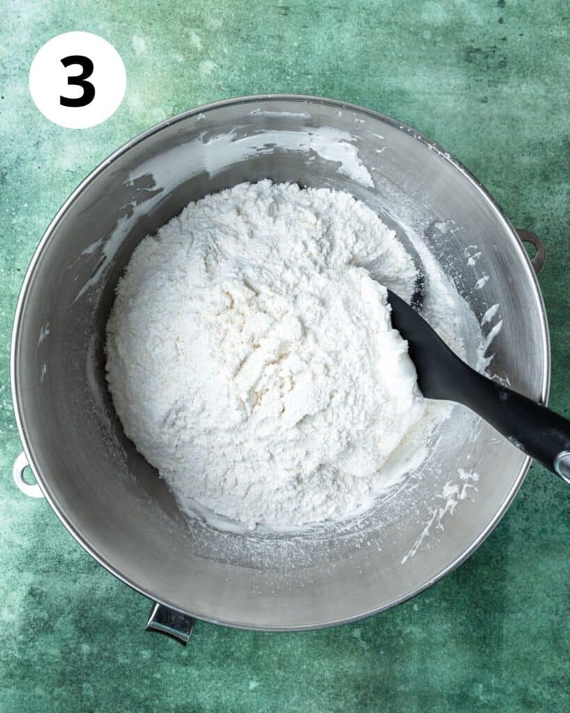 adding dry ingredients to meringue. 