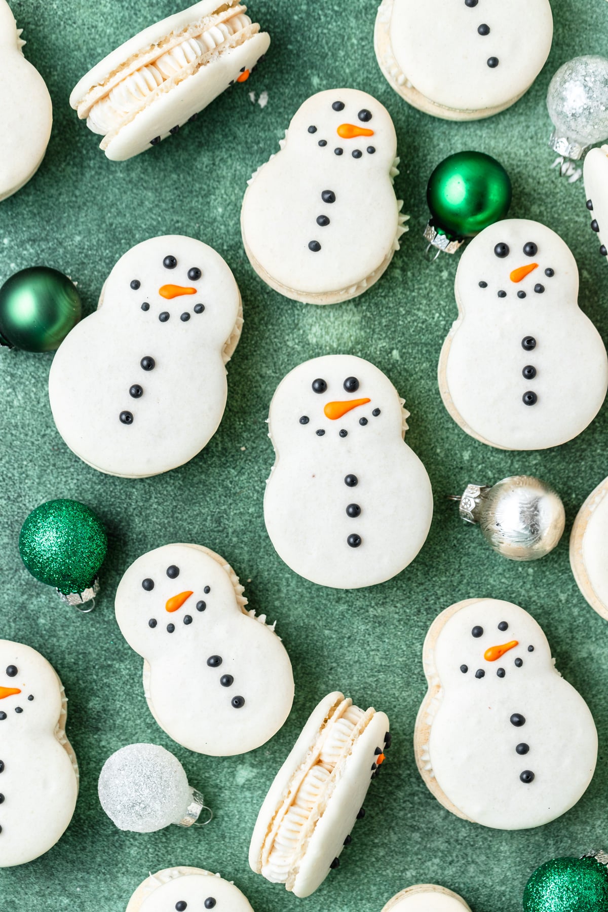 snowman shaped macarons with eggnog buttercream.