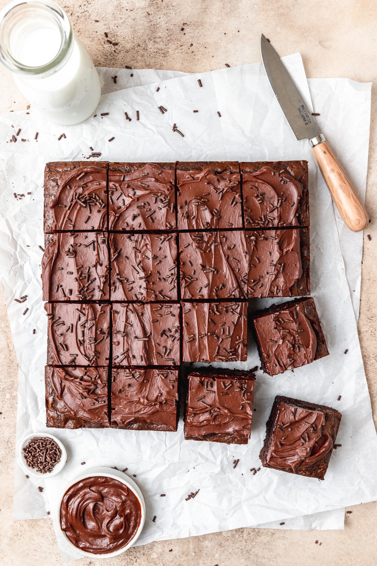 triple chocolate brownies frosted with chocolate ganache.