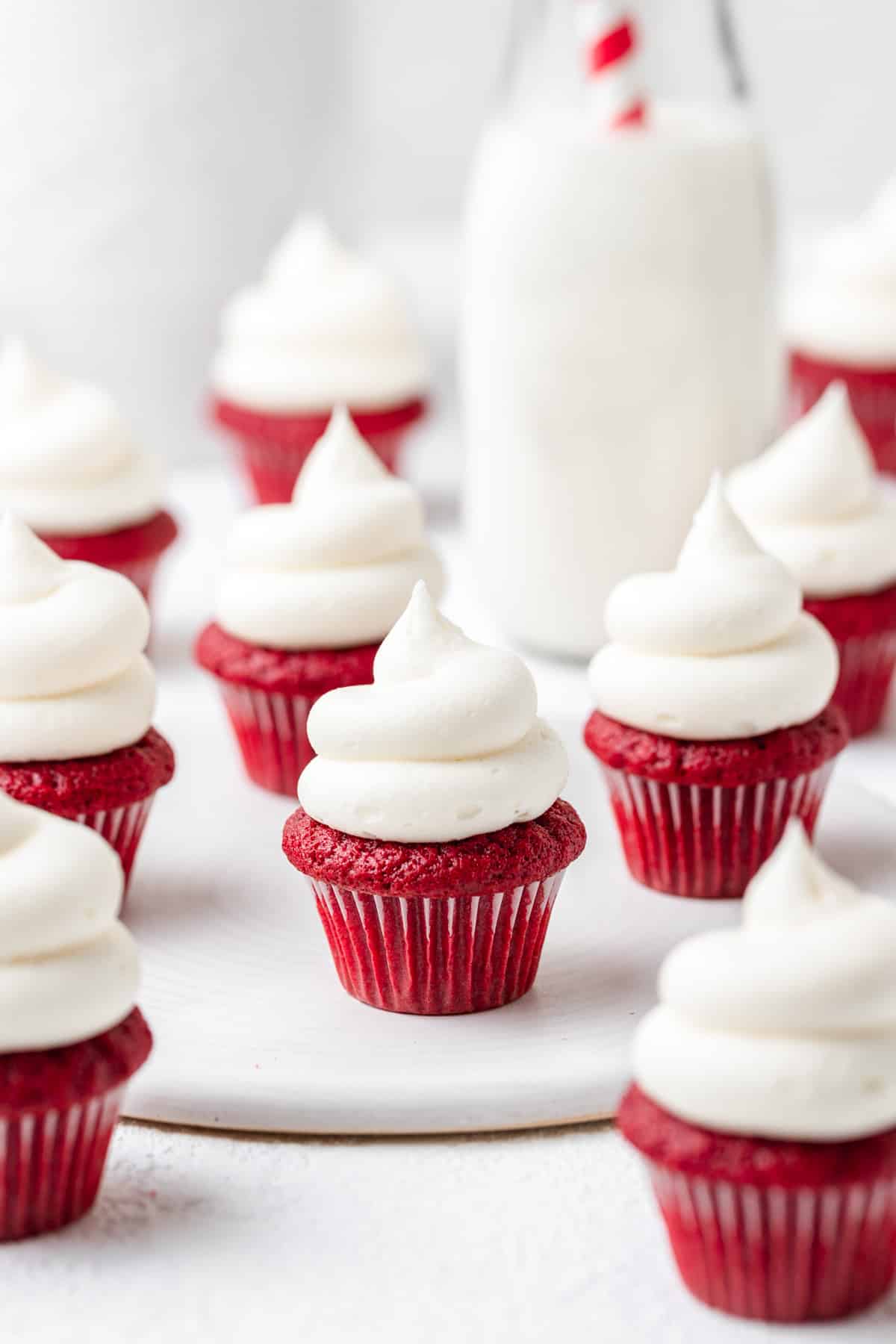 mini red velvet cupcakes with cream cheese frosting.