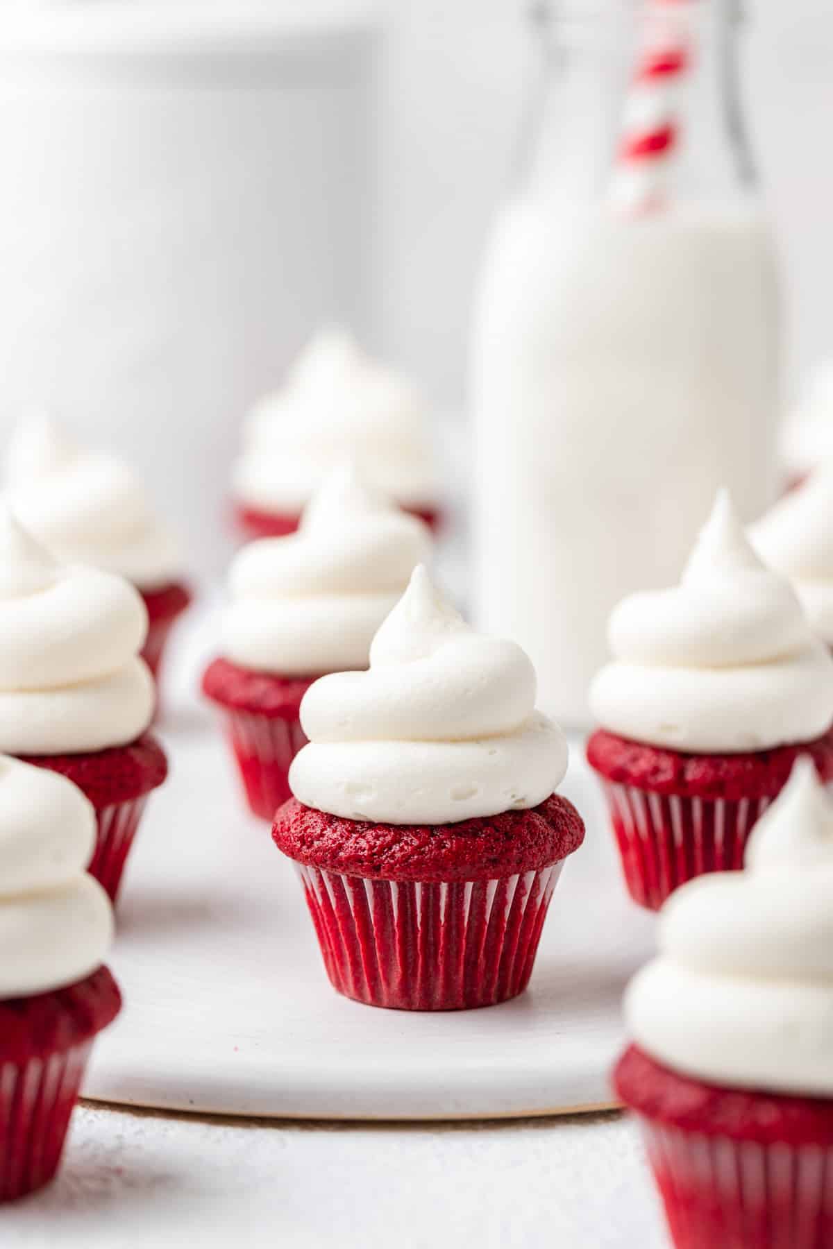 mini red velvet cupcakes with cream cheese frosting.