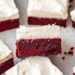 red velvet brownies frosted with cream cheese frosting.
