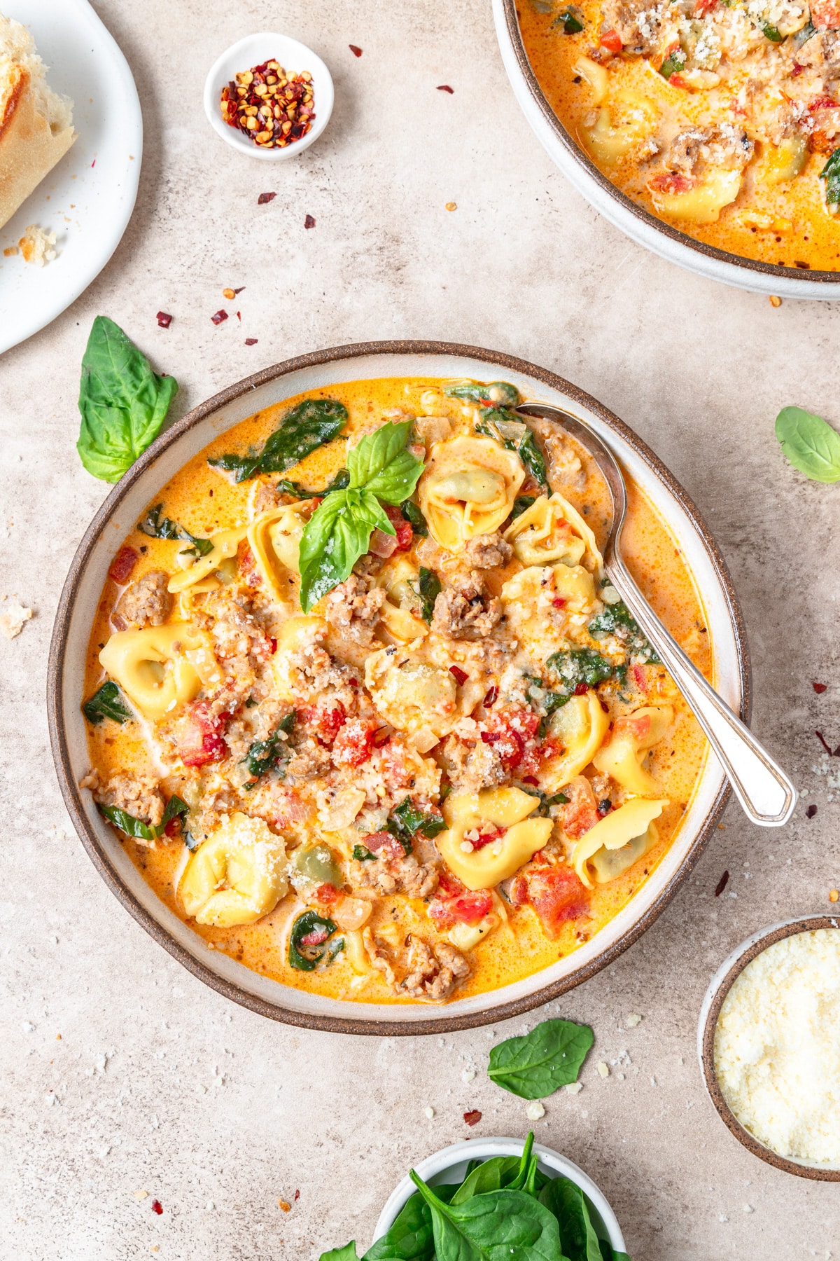 spinach tortellini soup with Italian sausage and parmesan.
