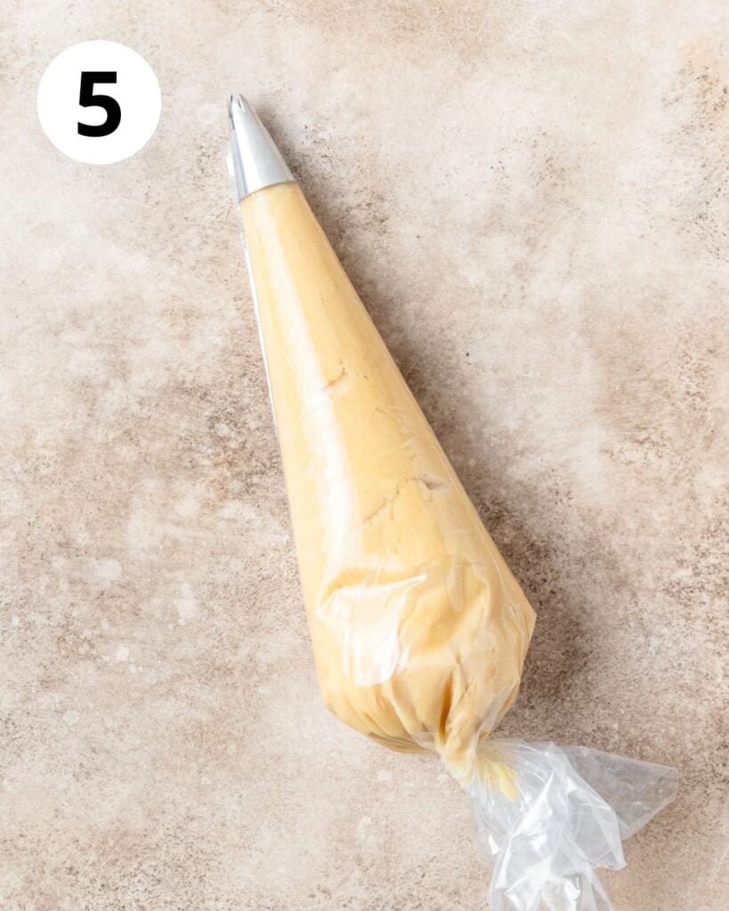 churro dough in piping bag.