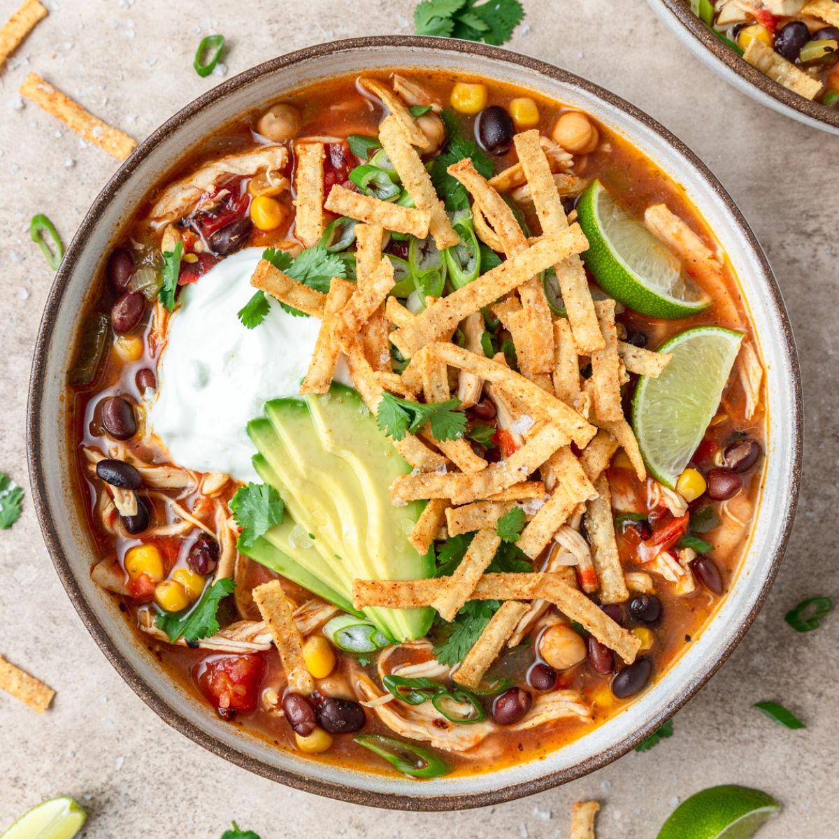 close up of slow cooker chicken tortilla soup.