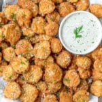 close up of homemade fried pickles with buttermilk ranch.