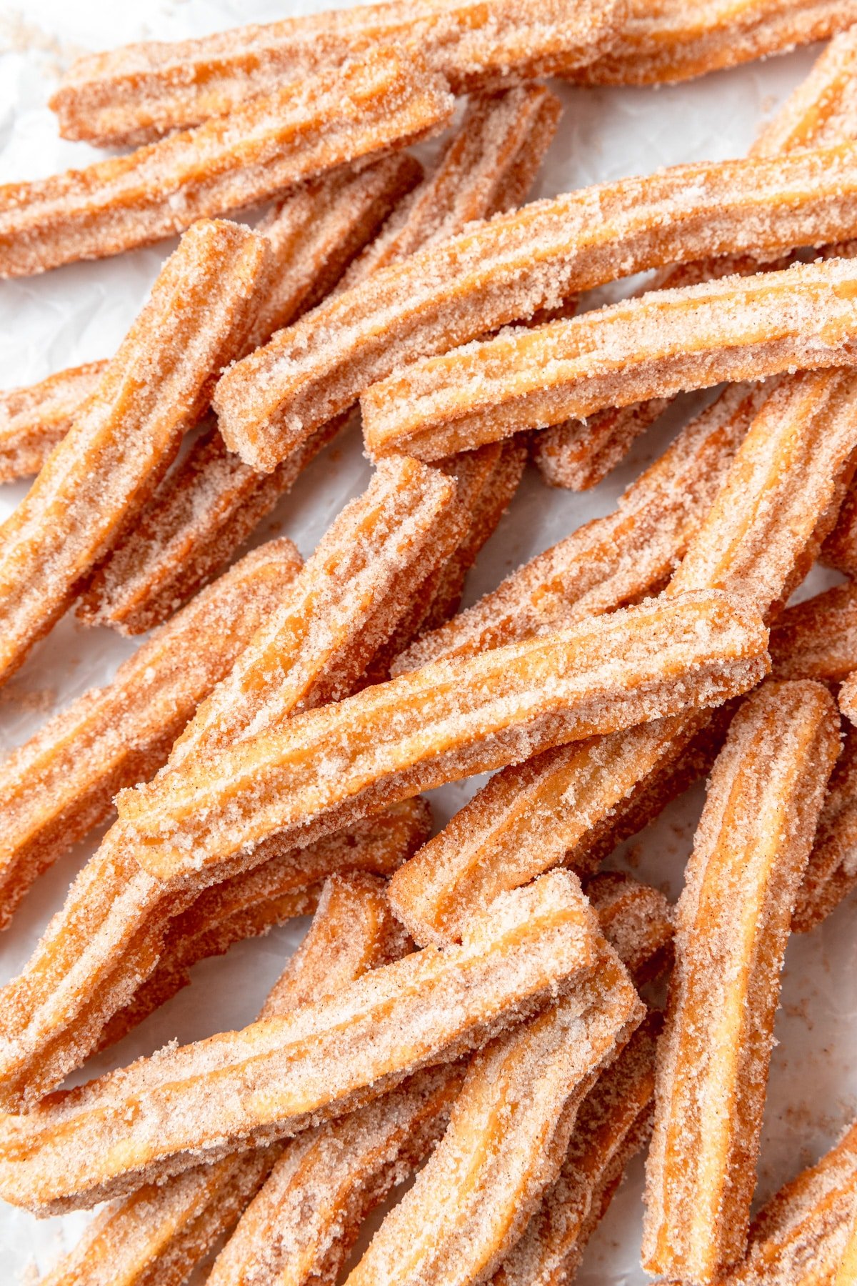 homemade churros rolled in cinnamon sugar.