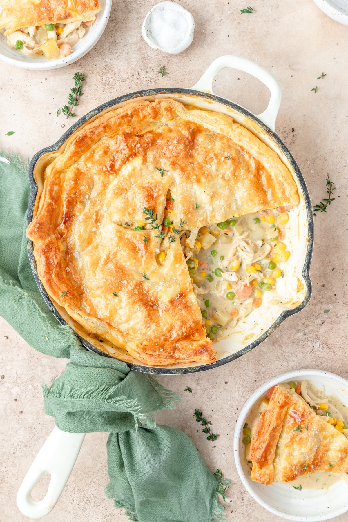 skillet chicken pot pie topped with puff pastry.