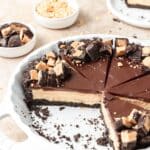 close up of chocolate peanut butter pie with oreo crust.