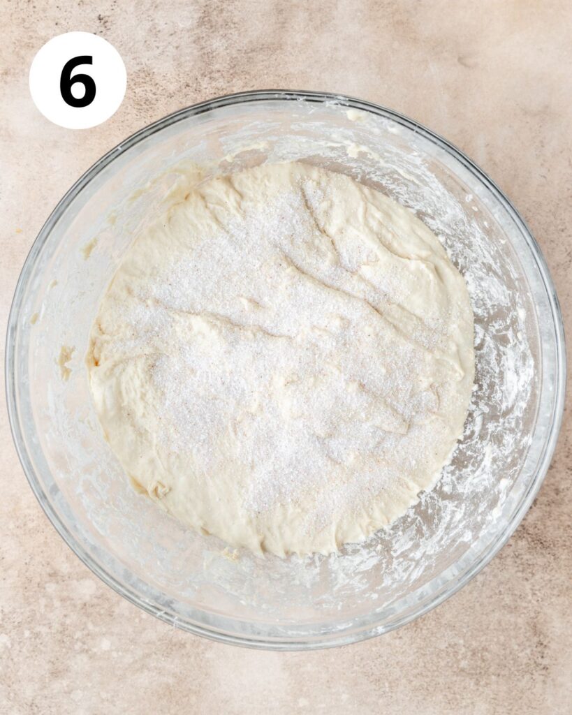 adding salt to the bread dough.