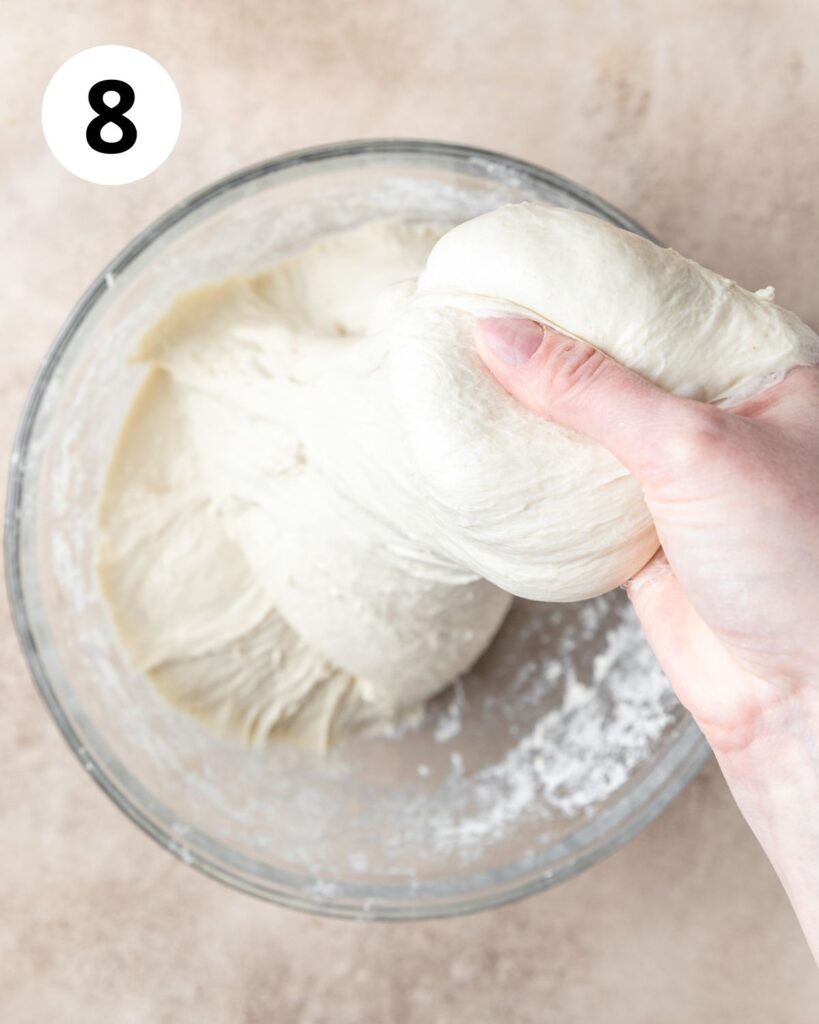 pulling dough straight up to stretch.